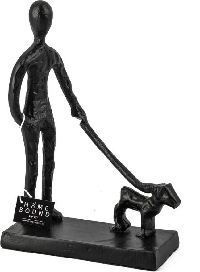 Beeld man met hond zwart