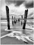 Artland Artprint Houten palen aan het Ostseestrand als artprint op linnen poster in verschillende formaten maten - Thumbnail 1