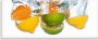 Artland Print op glas Citrusvruchten vallen in helder water - Thumbnail 1