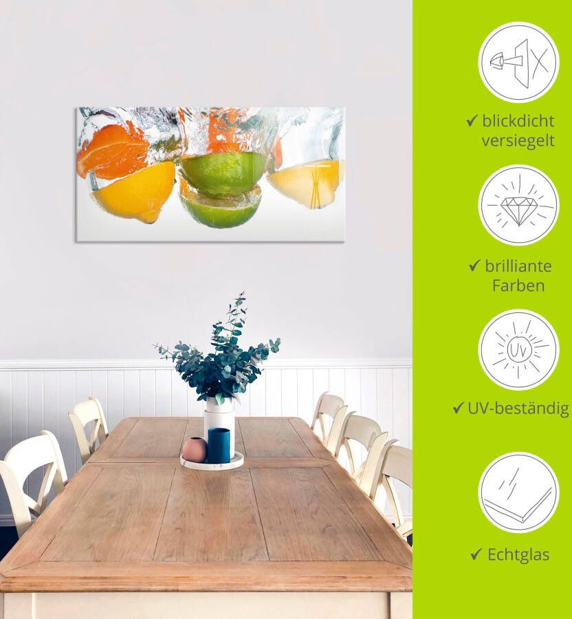 Artland Print op glas Citrusvruchten vallen in helder water