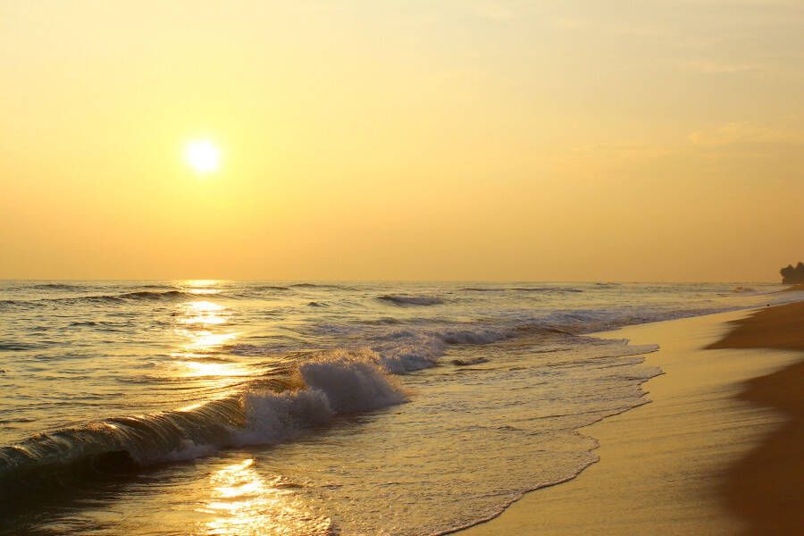 Papermoon Fotobehang Sunset beach Sri Lanka