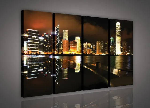 Schilderij - Hong Kong - Stad - Lichten - Skyline - Toren - Gebouw - Schilderij Woonkamer - Schilderijen op canvas - Inclusief Frame - 120x80cm (LxB) - 4 Luiks - 4 Delen