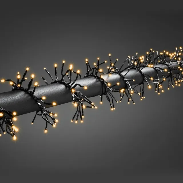 Konstsmide 6563-870 Clusterlichtketting met app Buiten Energielabel: E (A - G) werkt op het lichtnet Aantal lampen 960 LED Amber Verlichte lengte: 7.2 m