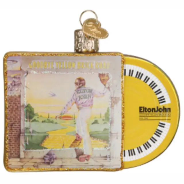 Old World Christmas Glazen Kerstbal Elton John Album Goodbye Yellow Brick Road – Old World Christmas – 10 cm Geel, Wit, Goud en zwart