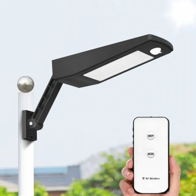 RexTech Solar wandlamp buiten 'Paddle' - Zwart - 900 lumen - Helder wit licht (5000K) - IP65 - Schijnwerper met bewegingssensor - Tuinverlichting op zonne-energie