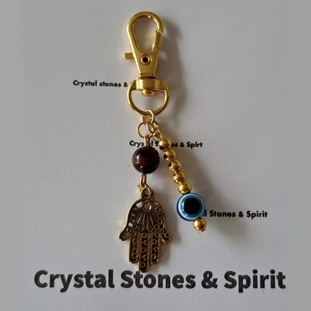 mineraalsteen Boze Oog / Khamsa met "Tijgeroog Rood", sleutelhanger goudkleurig