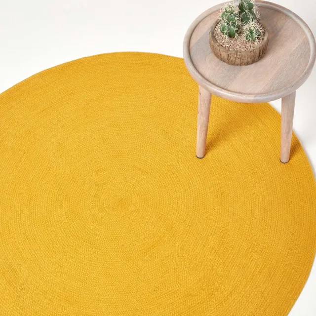 Homescapes Handgeweven gevlochten vloerkleed in mosterdgeel, 150 cm rond