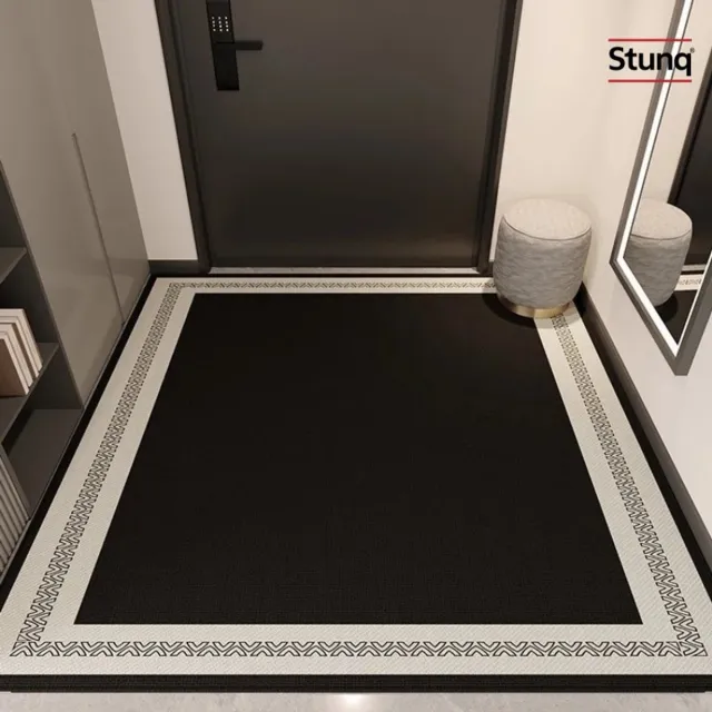 Stunq Minimalistische zwarte deurmat met witte geometrische rand