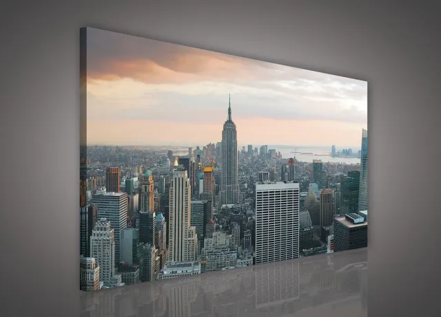 Schilderij - New York - Stad - Lichten - Skyline - Toren - Blauw - Gebouw - Schilderij Woonkamer - Schilderijen op canvas - Inclusief Frame - 100x75cm (LxB)