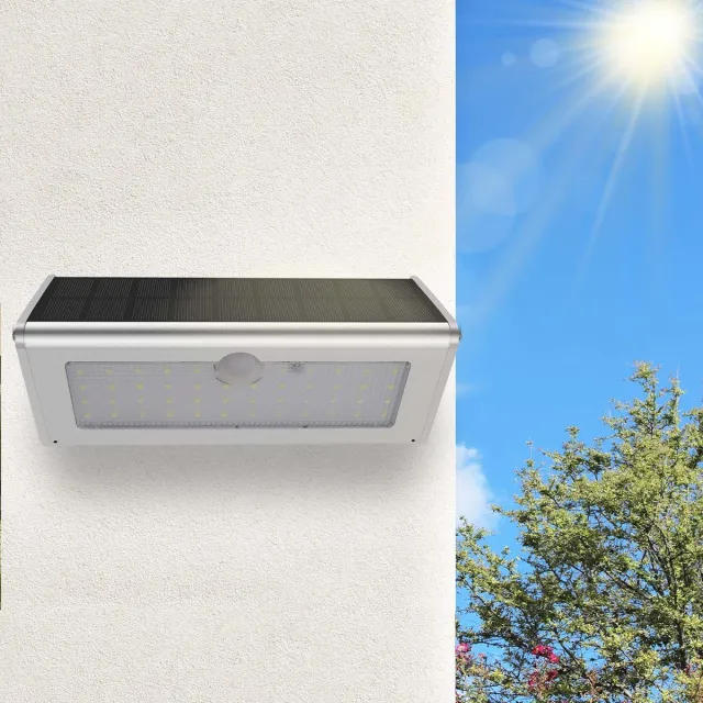 Ynkkvre solarlamp – solar buitenlamp met bewegingssensor – 4 lichtmodi, 46 LED’s, 1100 lm – IP65 waterdichte LED spotlight – voor tuin en binnenplaats Zilver