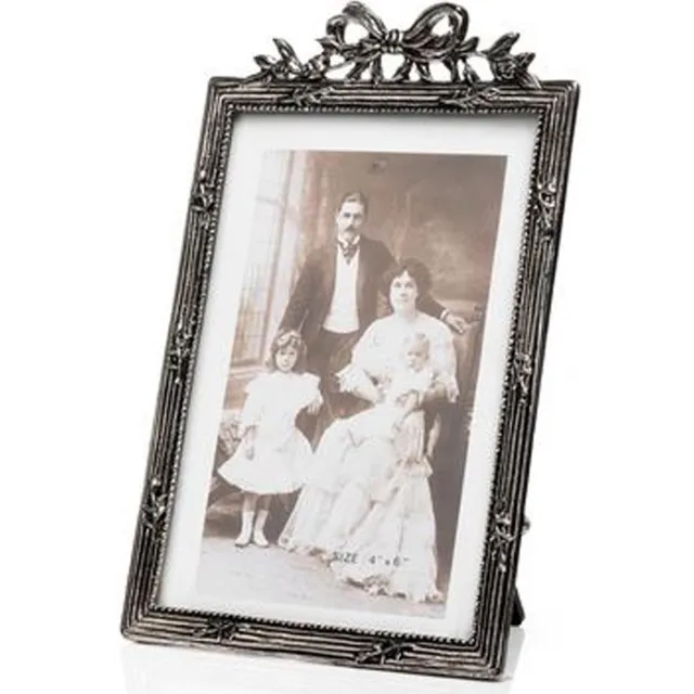 Alle lijsten AL - Antieke fotolijst Strik Staand 5x8 cm Verzilverd
