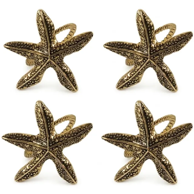 NUVEX Goudkleurige servetringen set van 4 – metalen servethouder ringen met zeester ontwerp – decoratieve servet ringen met oceaan thema en reliëf – tafeldecoratie voor diner feest bruiloft restaurant Goudkleurige - 4 stuks zeesterren