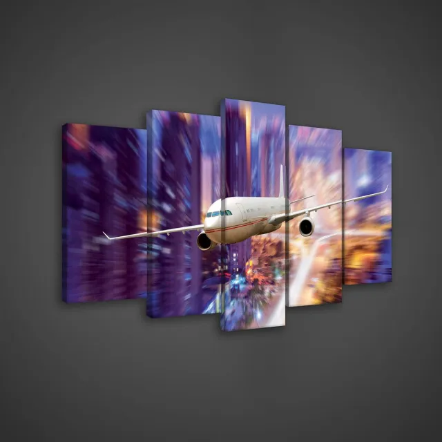 Canvas Schilderij - Vliegtuig - Stad - Toren - Steden - Inclusief Frame - 100x60cm - 5 Luiks Wit