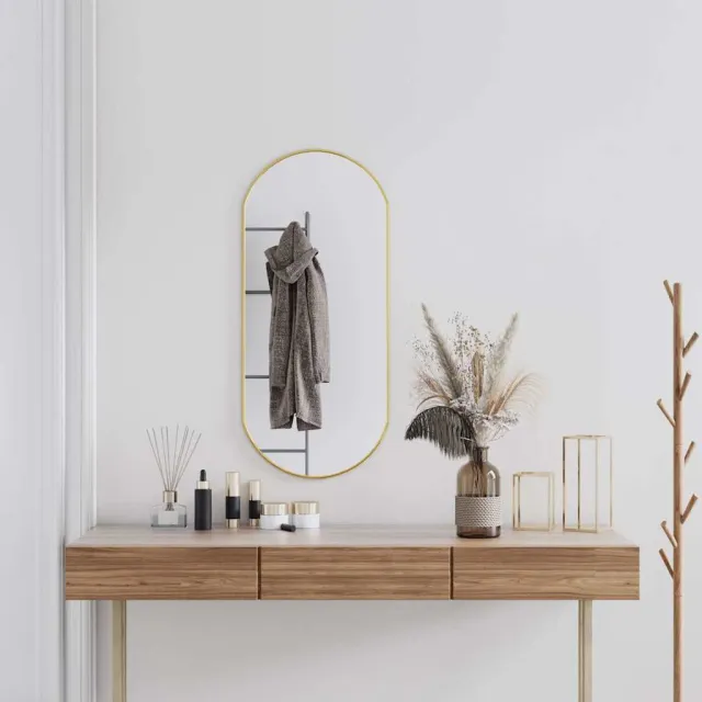 vidaXL Wandspiegel 90x40 cm ovaal goudkleurig
