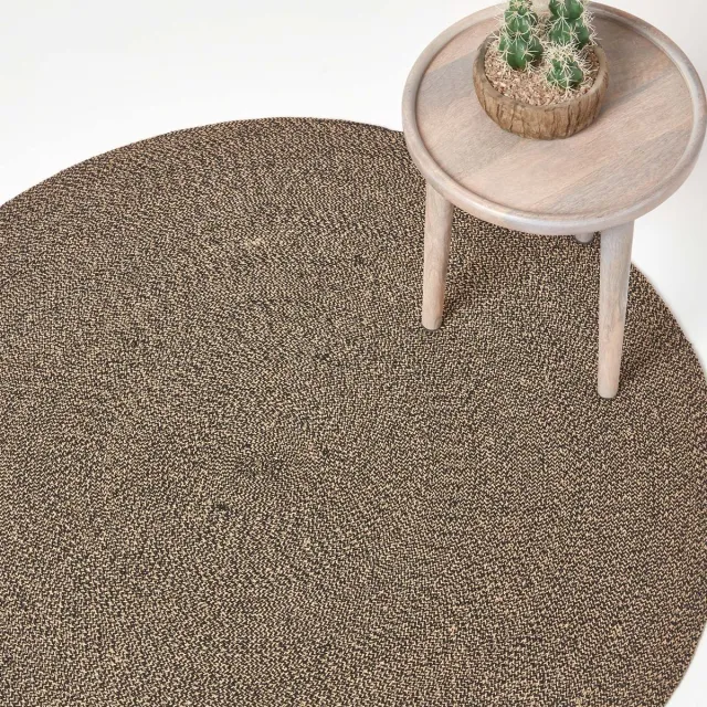 Homescapes Gevlochten handgeweven tapijt in beige en zwart, 120 cm rond