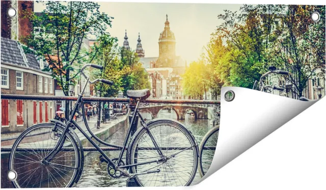 Gards Tuinposter Amsterdamse Brug bij een Gracht met Zonsondergang - 60x30 cm - Tuindoek - Tuindecoratie - Wanddecoratie buiten - Tuinschilderij Multikleur