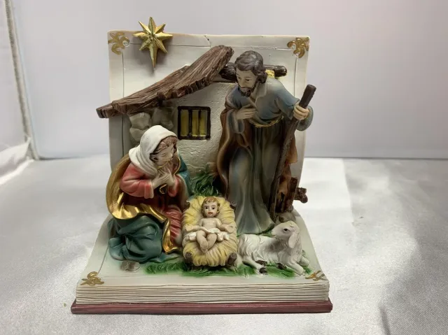 Dekoproject Kerststal in boek wit, bruin, blauw, roos, goud