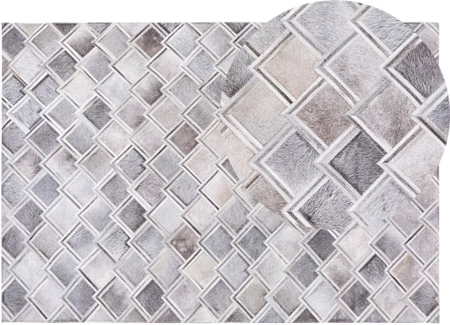 Beliani AGACLI - Laagpolig vloerkleed - Lichtgrijs - 140 x 200 cm - Koeienhuid