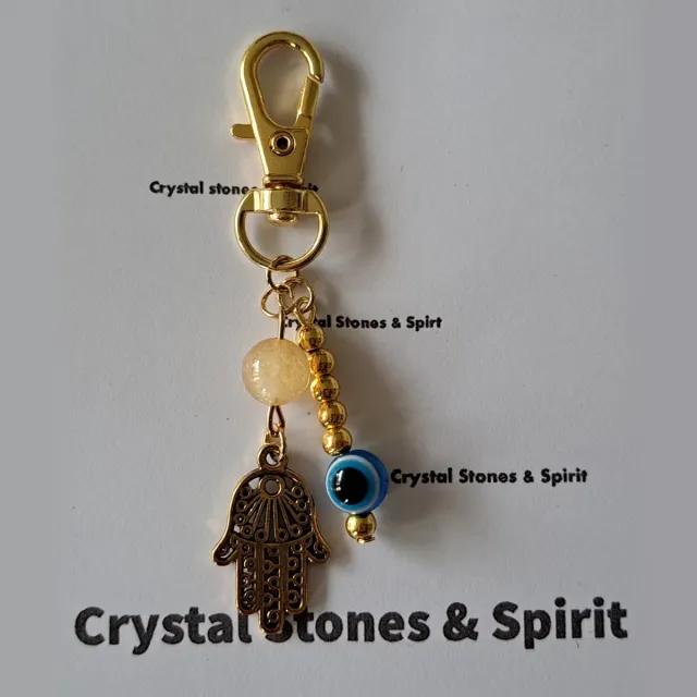 mineraalsteen Boze Oog / Khamsa met "Citrien" , sleutelhanger goudkleurig geel