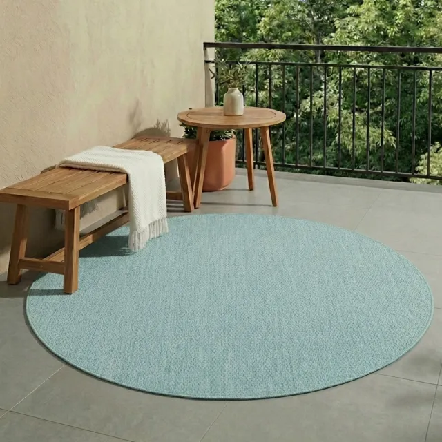 NATURL. Rond buitenkleed - Costa Turquoise | Zomerse budgettopper! - Ø 100cm
